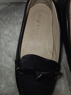 Cole Haan Women's Black Slip-On Loafers with Gold Trim